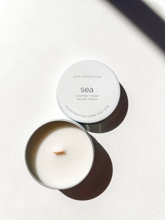 Sea- 2 oz cuke, melon, sea salt, freesia Travel Tin Candle